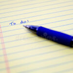 To Do List Written On Paper With Blue Pen Organizing And Plannin Stock